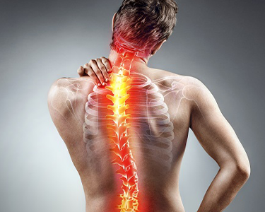 a man holding his back with a back pain