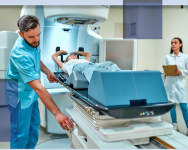 Radiation therapy session with patient, technician, and medical equipment in a modern cancer treatment facility.